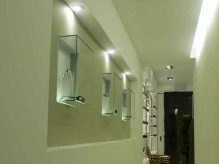 Archisio - Studio Antepost - Progetto Negozio ottica mestre