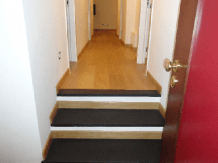 Archisio - Morabito Parquet - Progetto Particolare battiscopa in rovere su pedate