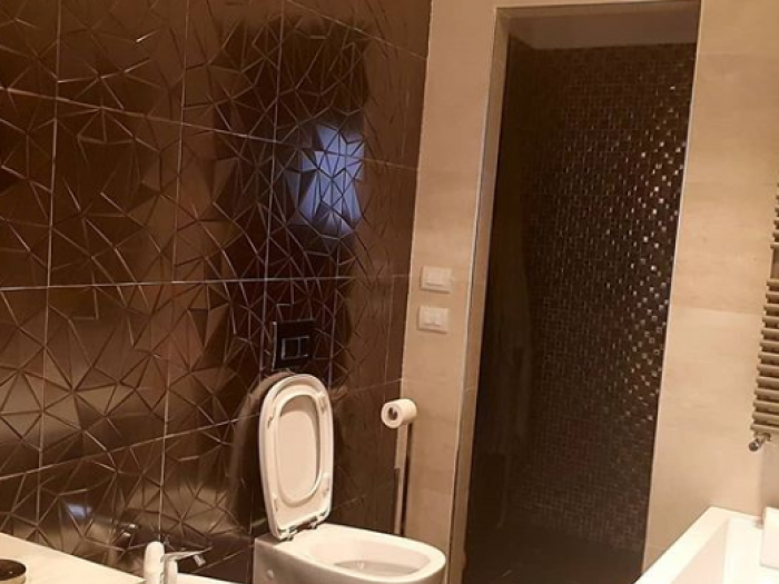 Archisio - Andrea Candente - Progetto Bagni