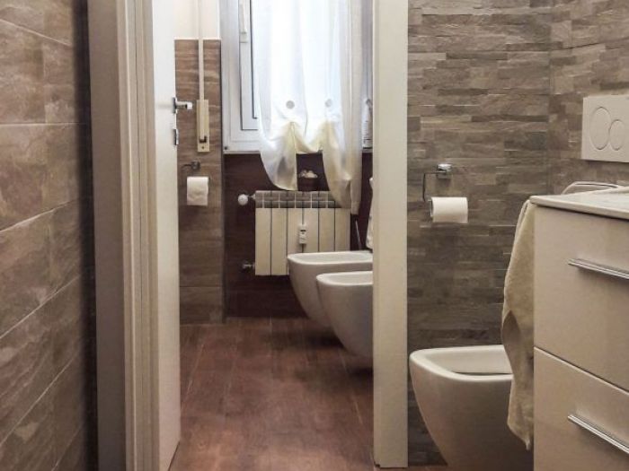 Archisio - Mc Rendering Solution - Progetto il bagno si fa in due