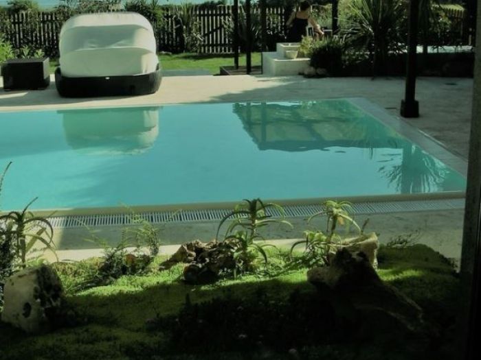 Archisio - Tiziana Galosi - Progetto Progettazione piscina e giardino di una villetta