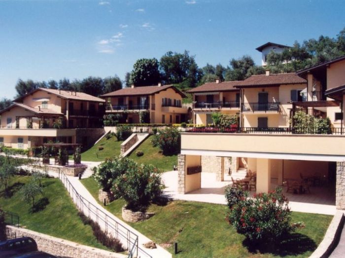 Archisio - Dossi Costruzioni - Progetto Realizzazioni turistiche