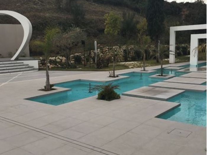 Archisio - Malagrida Group Srl Canalina Infinity - Progetto Piscina resort