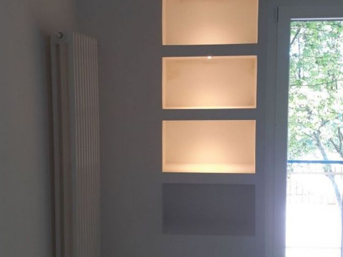 Archisio - Mani Srl Ristrutturazini - Progetto Realizzazione PrecedenteCamera da letto con armadio nascosto roma zona magliana
