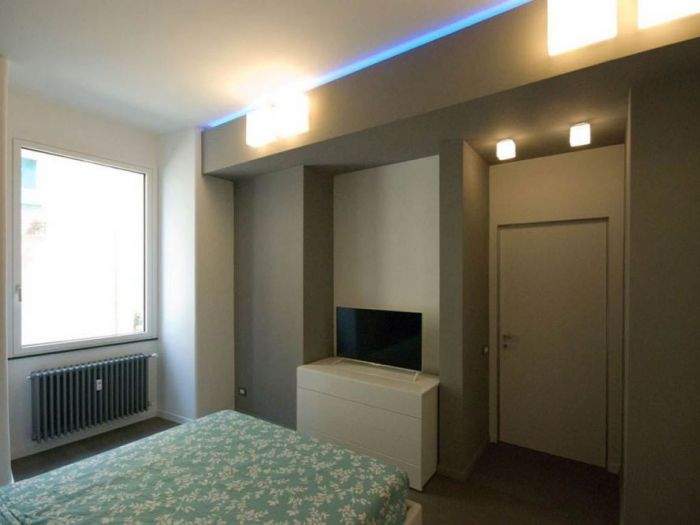 Archisio - Roberto Silvestri - Progetto Pietra acciaio e led una casa dai contrasti vivi