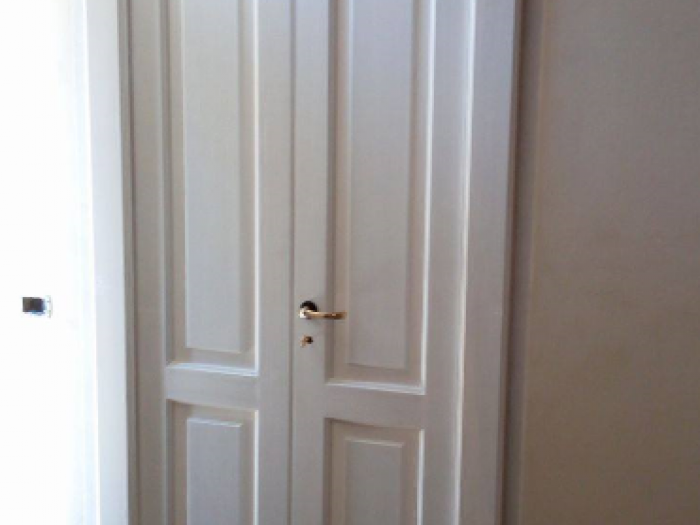 Archisio - Falegnameria Sartor E Puggia Snc - Progetto Porte in legno