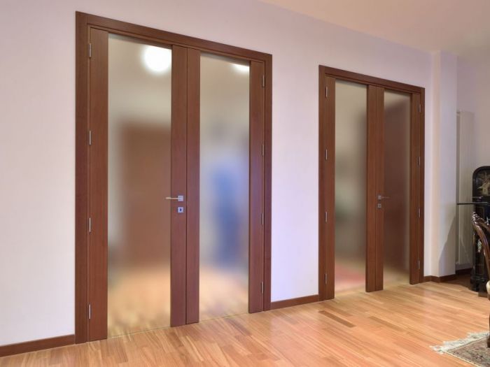 Archisio - Falegnamo - Progetto Porte su misura