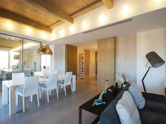 Archisio - Roberto Silvestri - Progetto Luce materiali spazio e una grande cucina