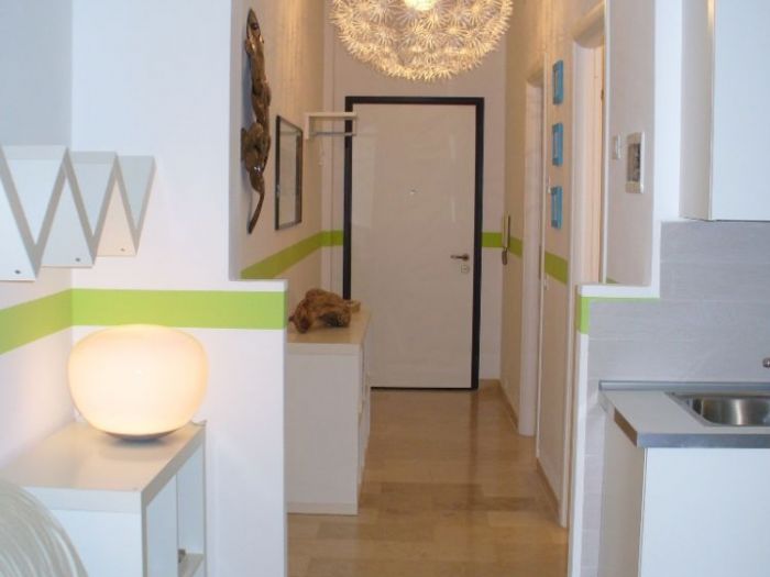 Archisio - Antonella Liguori Architetto - Progetto Casa di vacanze verde mela