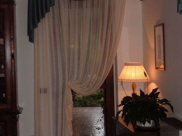 Archisio - Pezzoni Tappezzeria Tendaggi - Progetto Tende