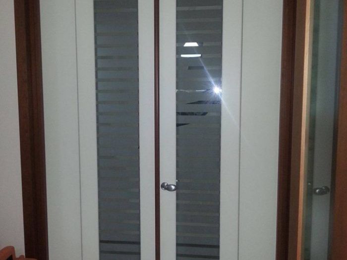 Archisio - Falegnameria Salvioli - Progetto Porta in legno scorrevole