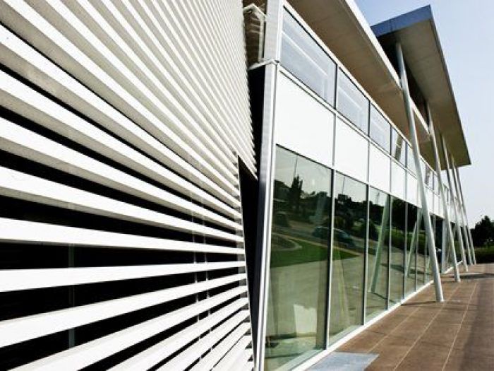 Archisio - Studio Merlini - Progetto Commercial building - restyling edificio commerciale
