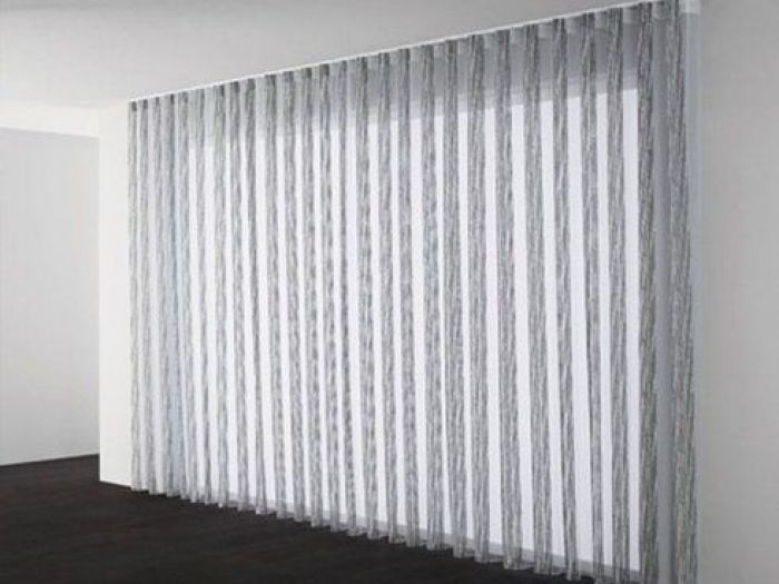 Archisio - Bertocchi Tappezziere Nellarredamento - Progetto Tende per interni