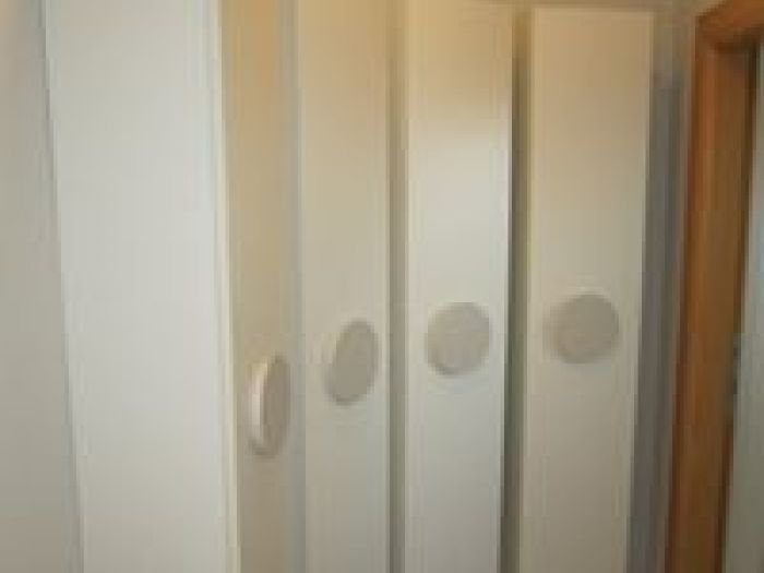 Archisio - Falegnameria Artigiana - Progetto Armadi