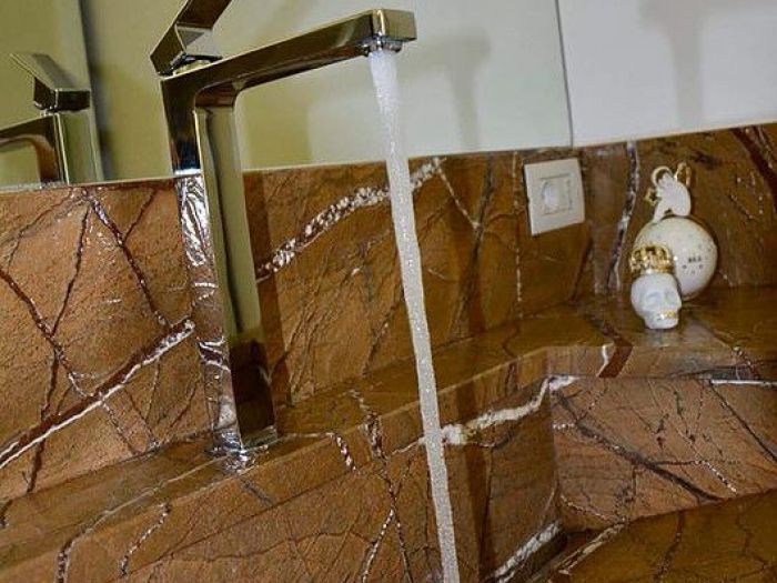 Archisio - Calabra Marmi - Progetto Bagni