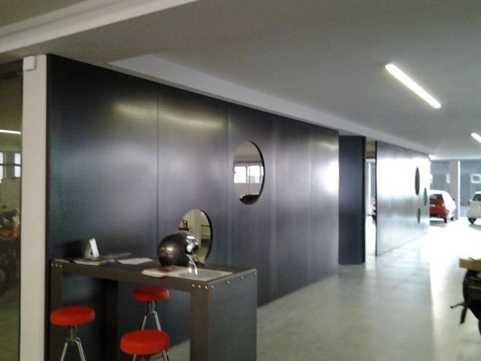 Archisio - Bravo Servizi Aziendali Di Bravo Maurino - Progetto Allestimento interno concessionaria