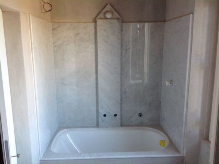 Archisio - Marmifera Badalassi C - Progetto Agglomerati materiali sintetici