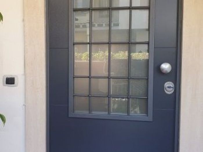 Archisio - Am Porte Sas - Progetto Porte blindate a vetro su misura