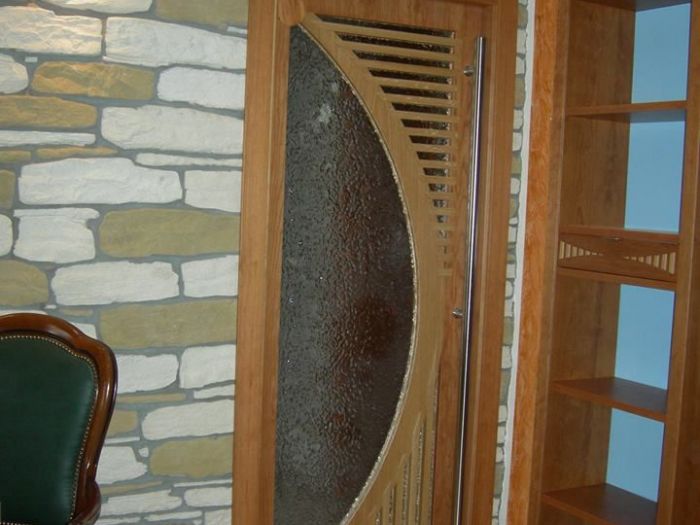 Archisio - Falegnameria Salvioli - Progetto Porta in legno con vetro