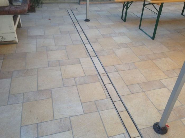 Archisio - Malagrida Group Srl Canalina Infinity - Progetto Cortile villetta