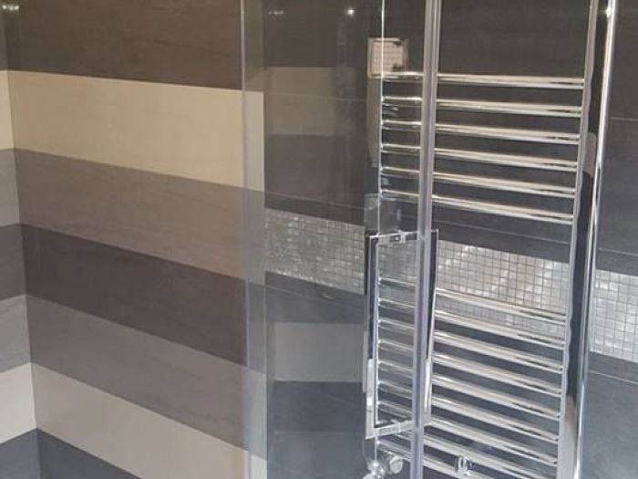 Archisio - Tortoglass - Progetto Vetri doccie e ringhiere di vetro
