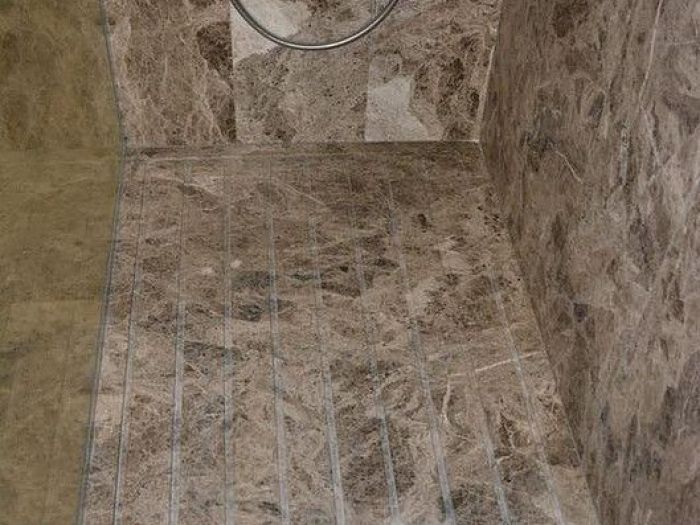 Archisio - Calabra Marmi - Progetto Bagni