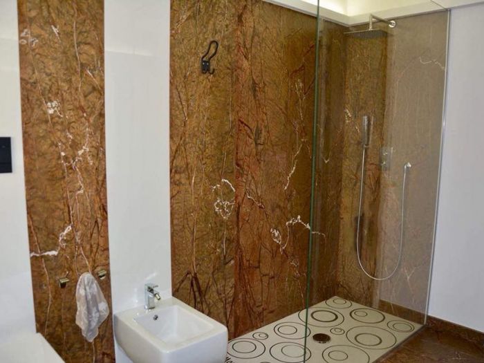 Archisio - Calabra Marmi - Progetto Bagni