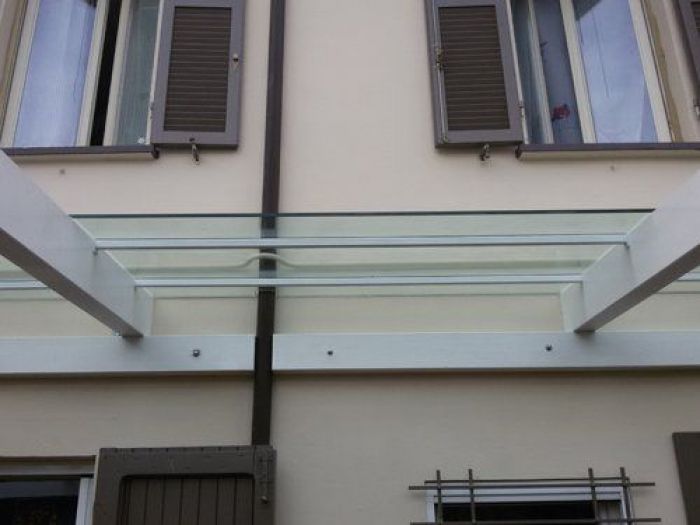 Archisio - Vetreria Dimensione Vetro - Progetto Parapetti e scale pensiline in vetro porte calpestabili e vetri decorati