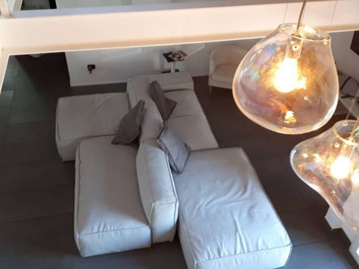 Archisio - Paola Illuminazione - Progetto Illuminare salone con soppalco