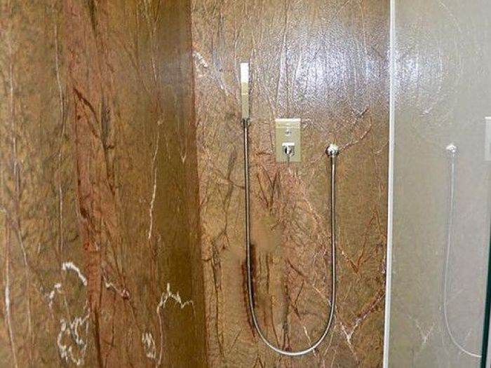 Archisio - Calabra Marmi - Progetto Bagni