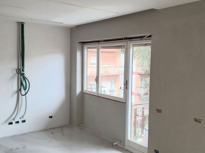 Archisio - Mani Srl Ristrutturazini - Progetto Accorpamento e ristrutturazione completa di due appartamenti in roma zona portuense