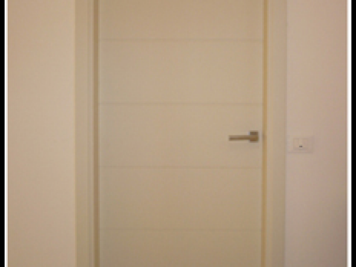 Archisio - Bottari Fabio Falegnameria - Progetto Porte interne e arte povera