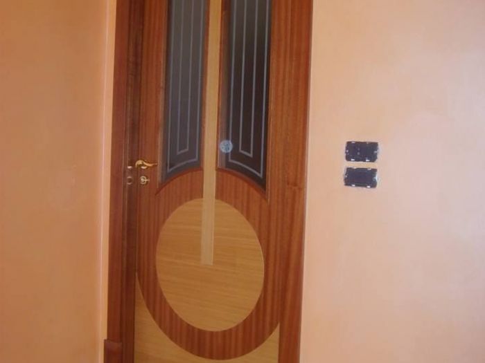 Archisio - Falegnameria Salvioli - Progetto Porta in legno