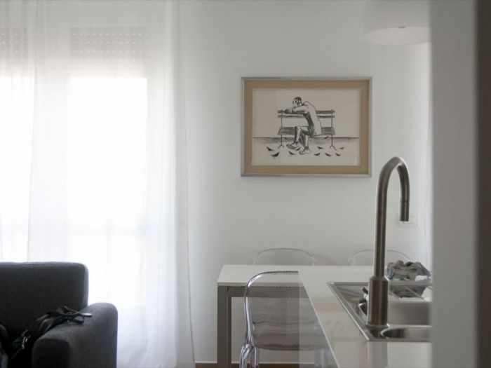 Archisio - Studio Ferretti - Progetto Da ufficio a residenza