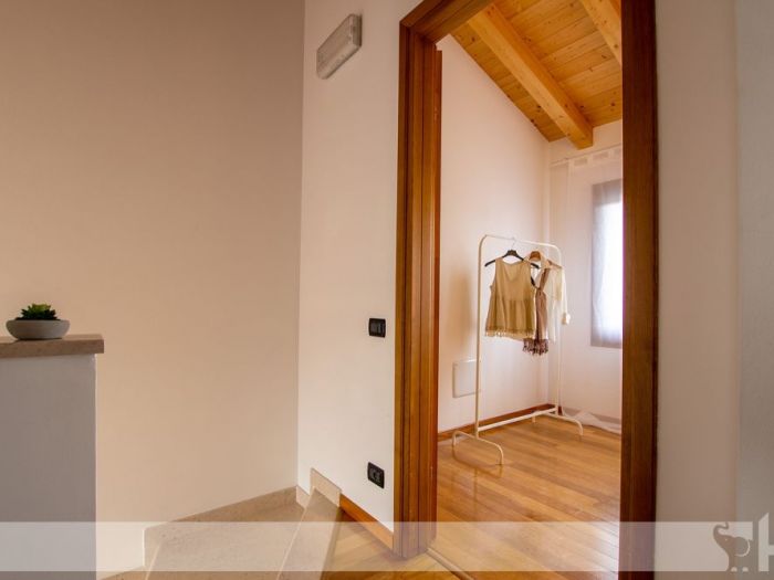 Archisio - Elisa Cattelan - Progetto Da una parete arancione ad uno stile etnic chic