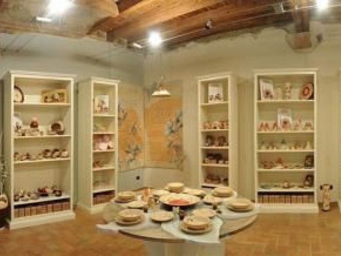 Archisio - Falegnameria Bini Antonio - Progetto Arredo negozio