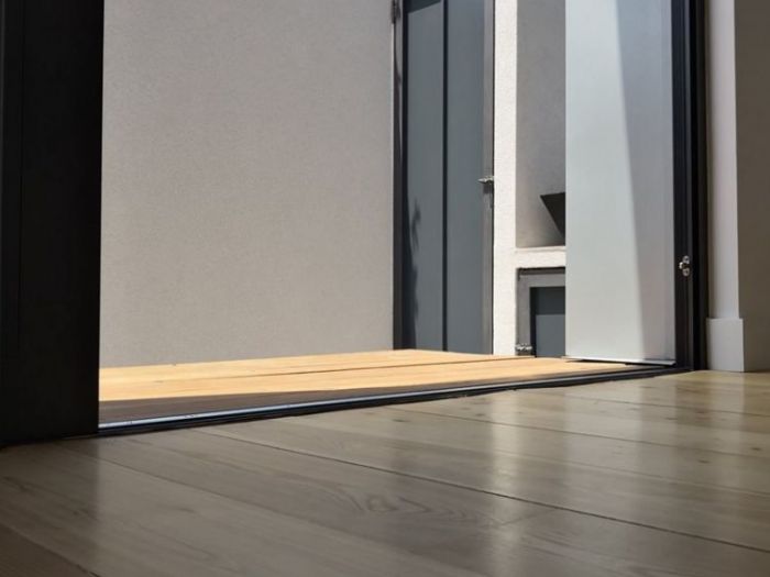 Archisio - Alfio Carmelo Lombardo - Progetto Structured attic with aluminum frames and glass titanium zinc cover