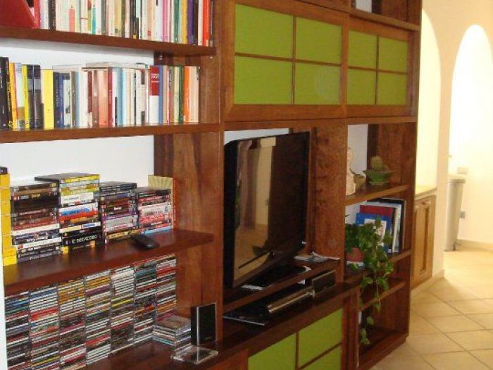 Archisio - Falegnameria Sardano Demurtas - Progetto Mobile sala legno frake