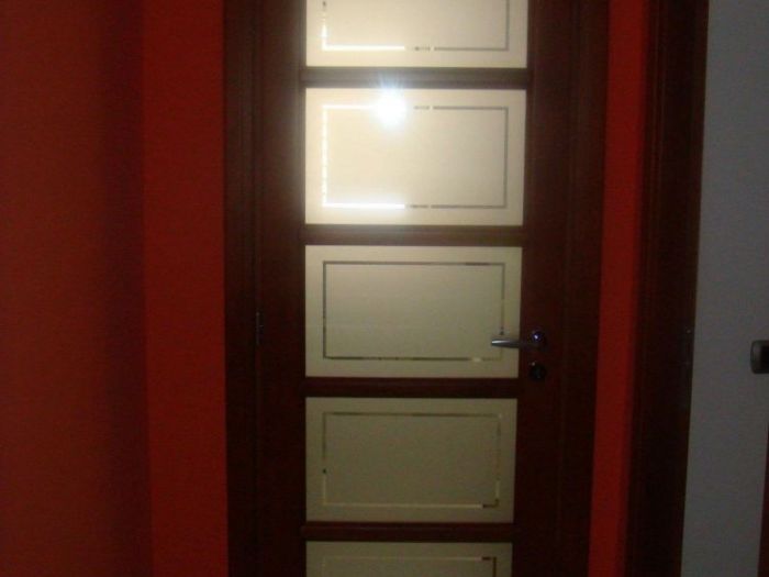 Archisio - Falegnameria Geo Snc - Progetto Porte portoni e cancelli