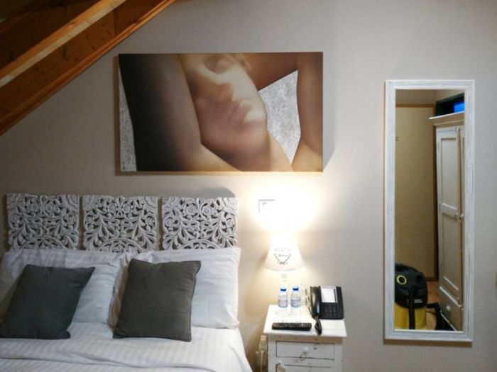 Archisio - Edodesign - Progetto Quadri presso hotel carouge e vicolo 39