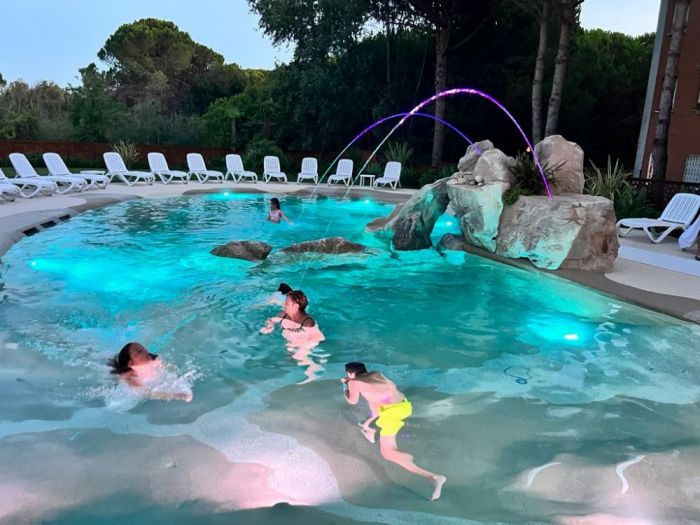 Archisio - Forme Dacqua - Progetto Giochi dacqua in piscina katja resort bosco canoro bibione ve