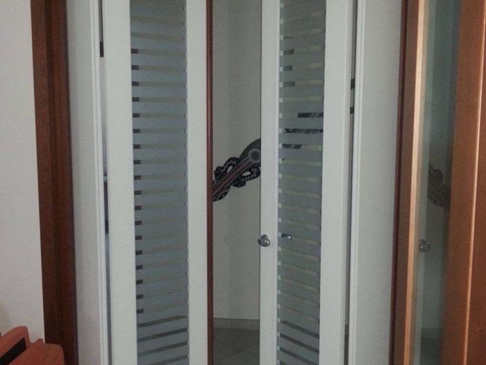 Archisio - Falegnameria Salvioli - Progetto Porta in legno scorrevole