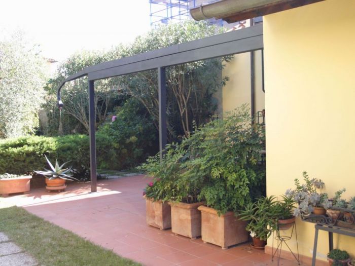 Archisio - Maurizio Moraldi - Progetto La loggia del dragoUno copertura tra due case una cerniera tra lo spazio domestico e quello celebrativo del coabitare