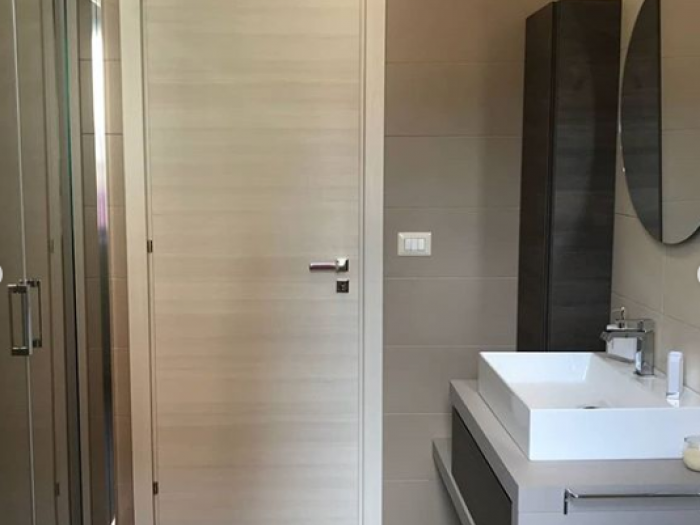 Archisio - Andrea Candente - Progetto Bagni