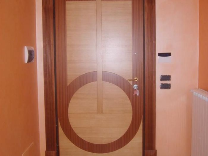 Archisio - Falegnameria Salvioli - Progetto Porta in legno