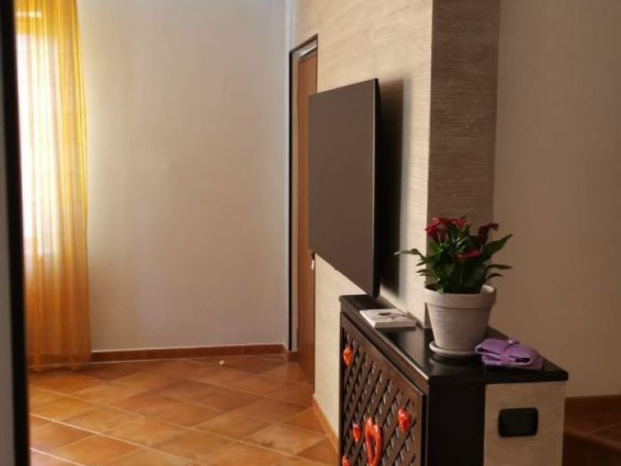 Archisio - Mani Srl Ristrutturazini - Progetto Decorativo pietra zen roma zona axa casalpalocco