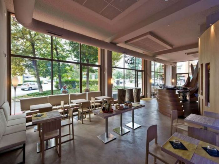 Archisio - Roberto Bardelli - Progetto Lequilibrio degli elementi dellarredamento locali trasmette al cliente unimmagine ben definita e immediata