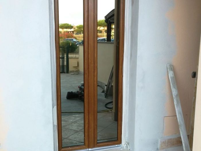 Archisio - Italservtech Infissi - Progetto Porta finestra