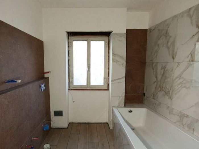 Archisio - Mani Srl Ristrutturazini - Progetto Realizzazione nuovo bagno roma zona laurentina