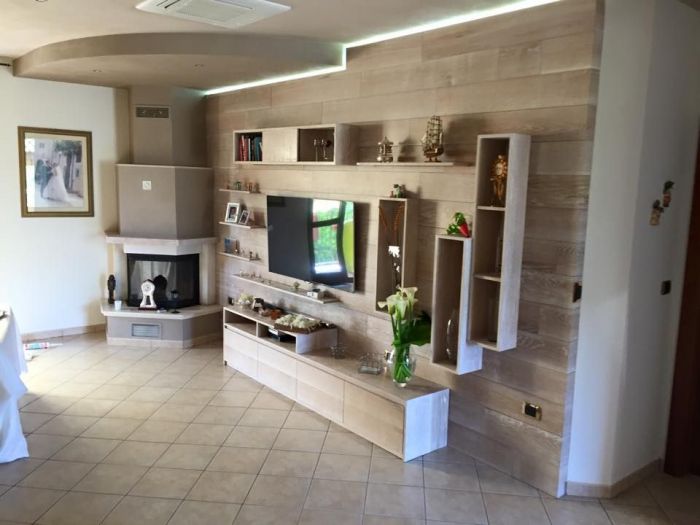 Archisio - Onlywood - Progetto Boiserie in rovere spazzolato edo store man espositori per mattonelle in cinelli store